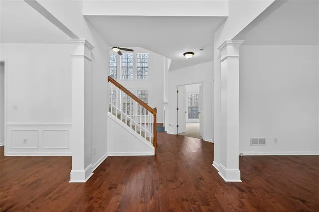 a view of entryway with wooden floor