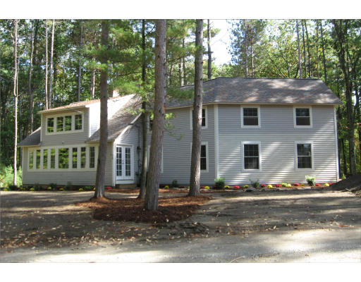 98 Kingland Road Stow, MA 01775 - Photo 1 of 15 a view of a house with a yard