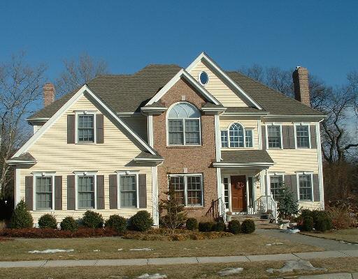 53 Mailands Road Fairfield, CT 06824 - Photo 1 of 1 a front view of a house with a porch