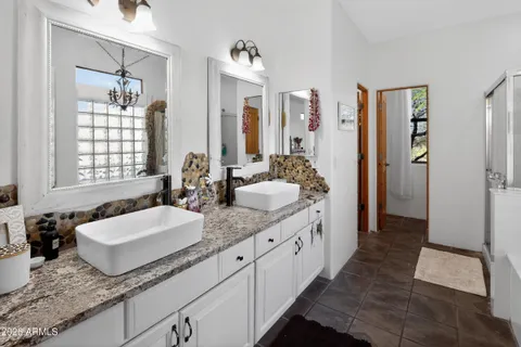a white toilet sitting next to a shower curtain