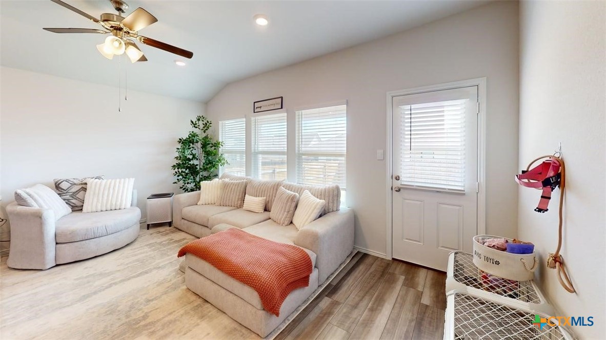 10016 Avendesora Road Killeen, TX 76542 - Photo 16 of 24 a living room with furniture flowerpot and a window