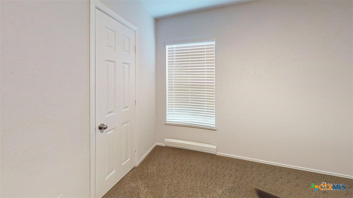 10016 Avendesora Road Killeen, TX 76542 - Photo 18 of 24 a view of an empty room with a window