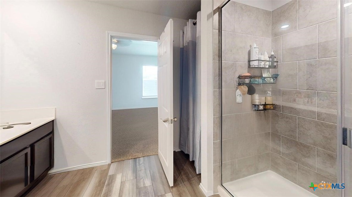 10016 Avendesora Road Killeen, TX 76542 - Photo 7 of 24 a bathroom with a shower