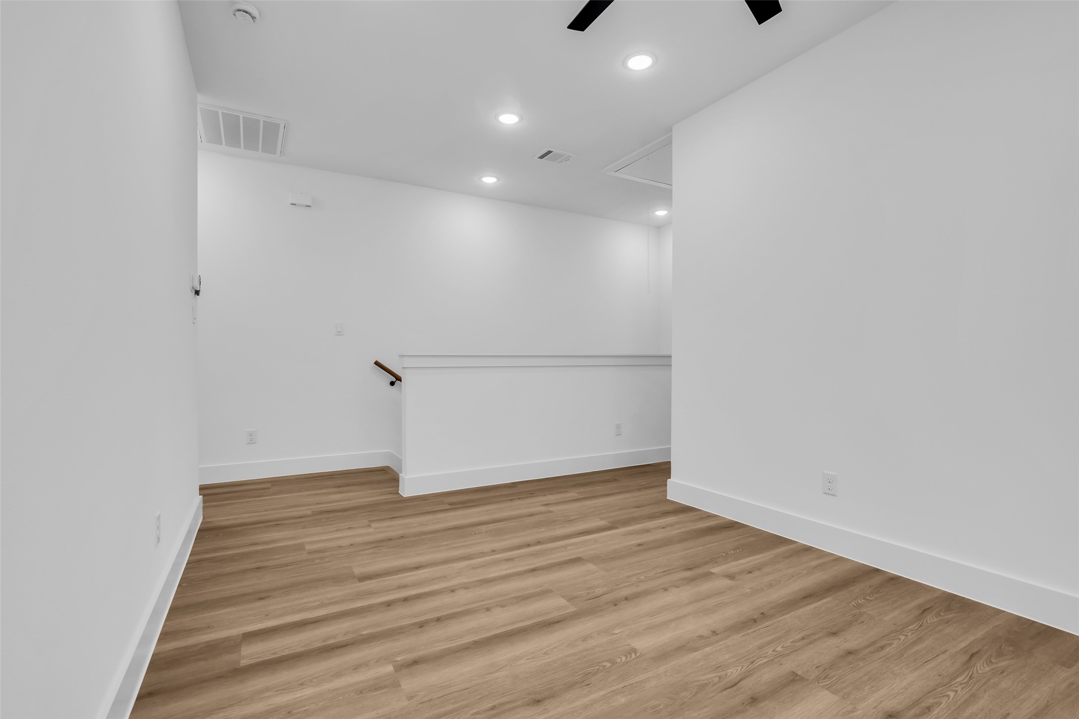 1506 Griffin Street Houston, TX 77009 - Photo 20 of 38 Top of the stairs at second floor features a wonderful flex area.
