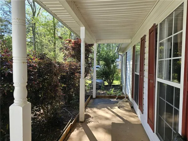 a view of backyard with green space