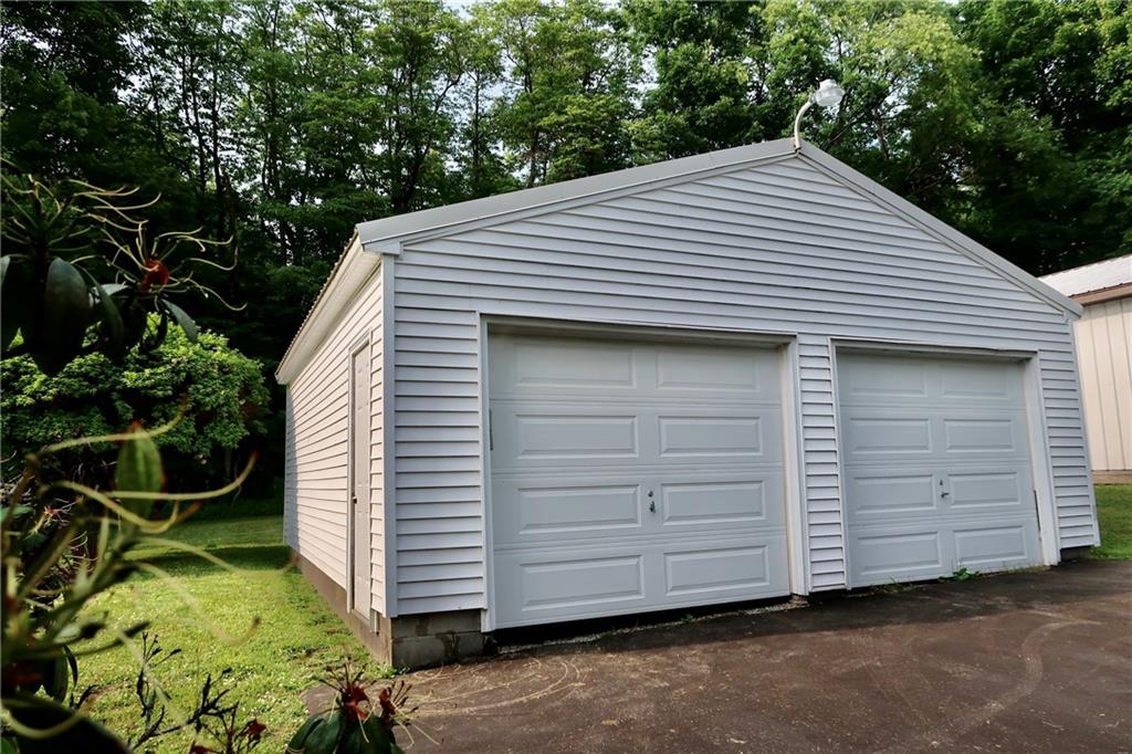 46 Reiber Road West Middlesex, PA 16159 - Photo 25 of 33 a front view of a house with a garden