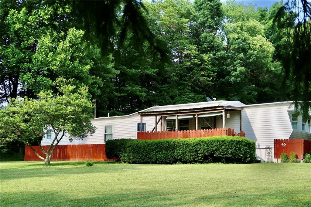 46 Reiber Road West Middlesex, PA 16159 - Photo 3 of 33 a front view of house with yard and green space