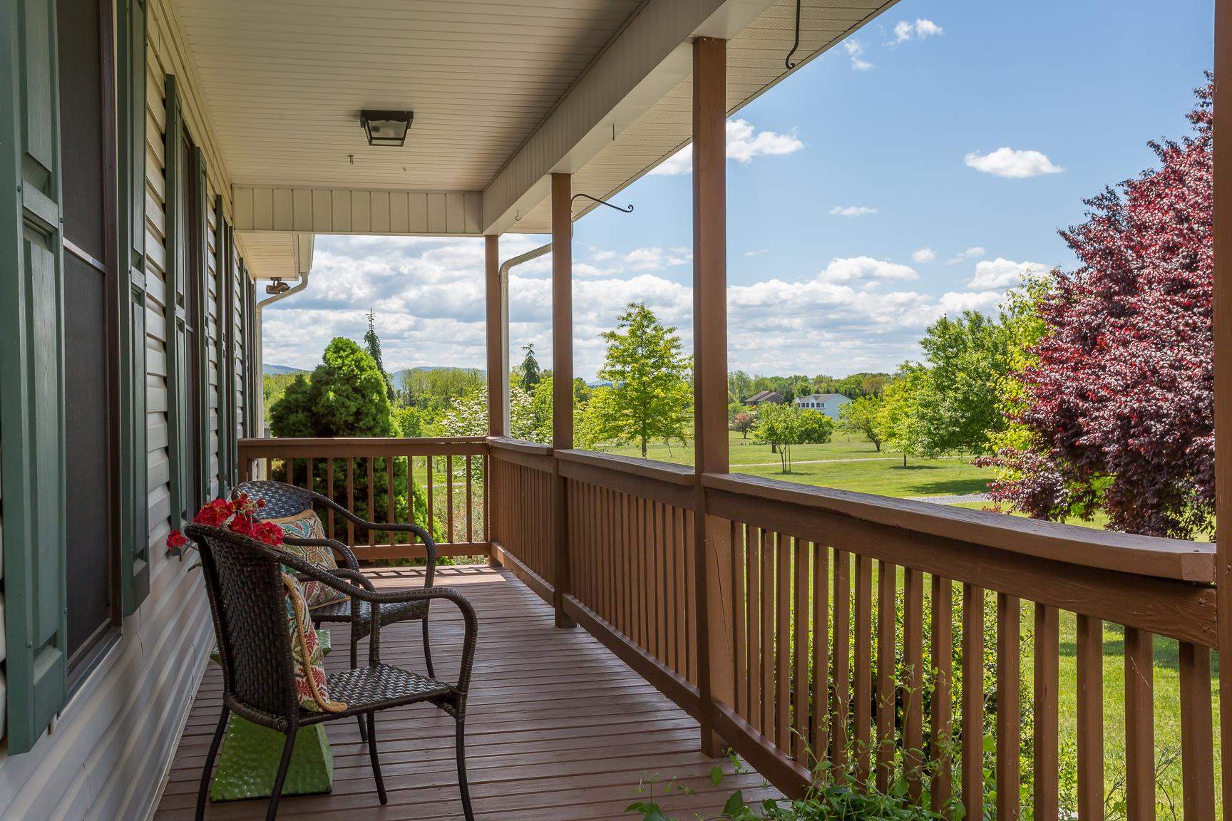 8455 East Timber Ridge Road Mount Crawford, VA 22841 - Photo 4 of 62 a view of a porch with furniture and garden view