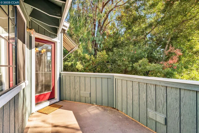 a balcony view with an outdoor space