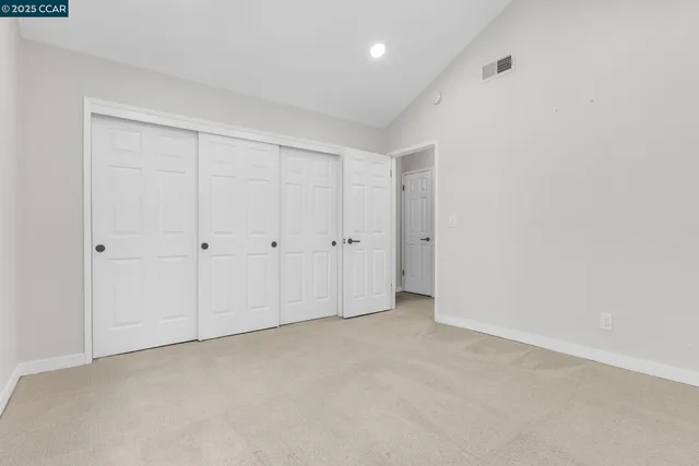 a bathroom with a sink toilet and mirror