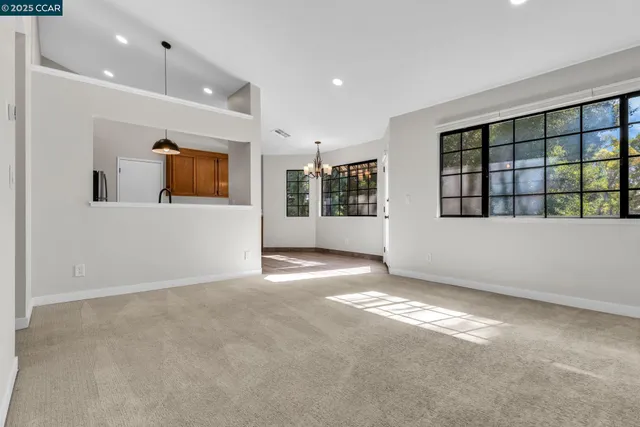 an empty room with windows