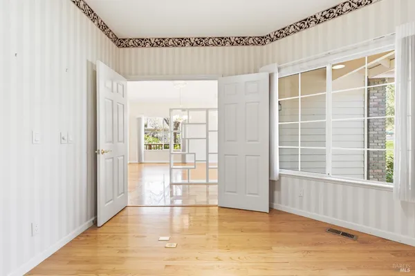 a view of an empty room with a window