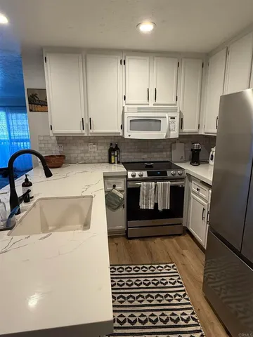 $3,180 | 7704 Caminito Tingo, Unit 102, Carlsbad, CA 92009