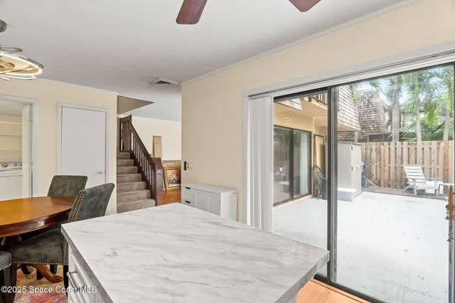 a kitchen with stainless steel appliances a sink stove and microwave