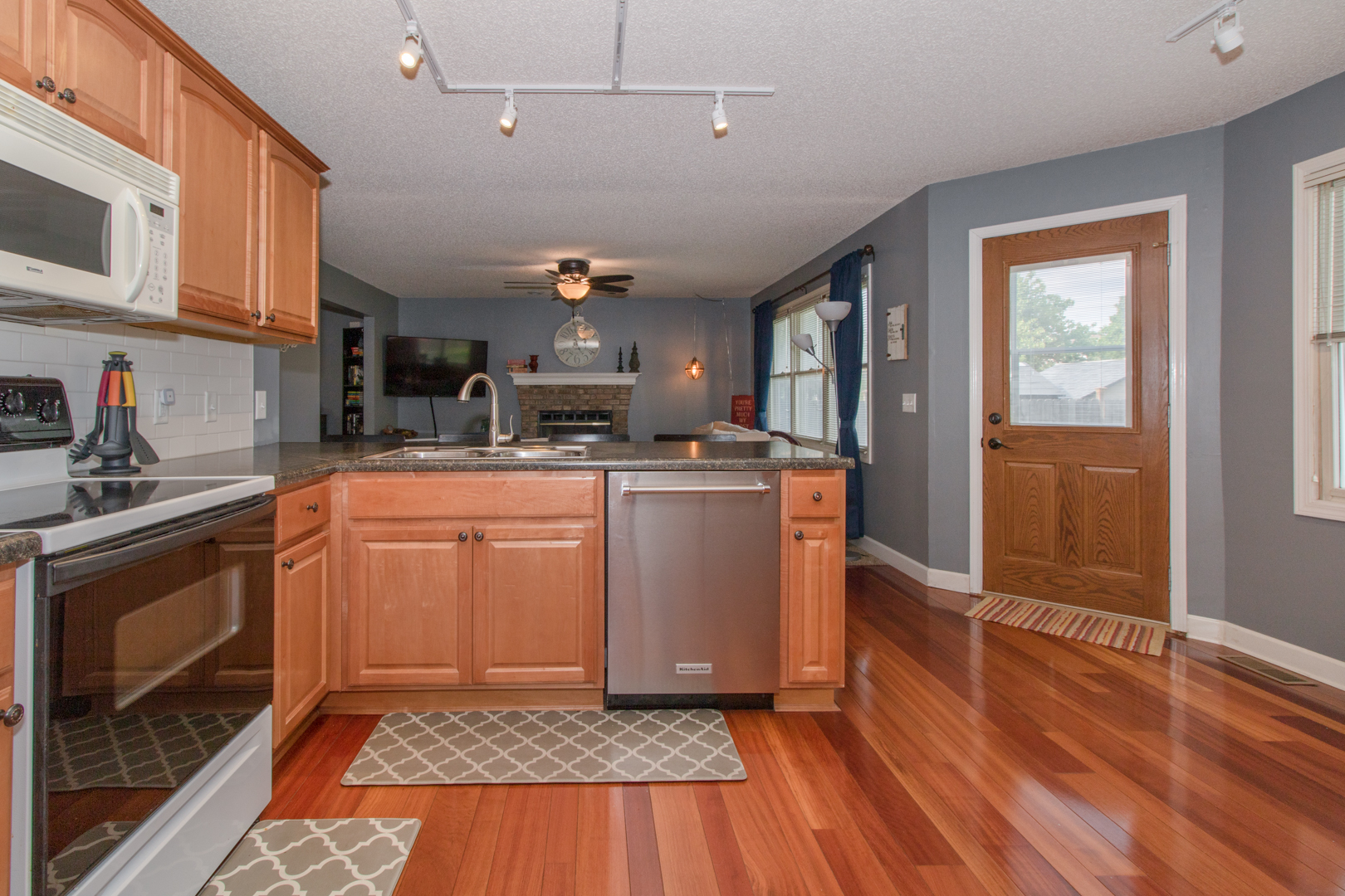 8 Holder Way Bloomington, IL 61704 - Photo 15 of 44 a kitchen with a sink stove and cabinets