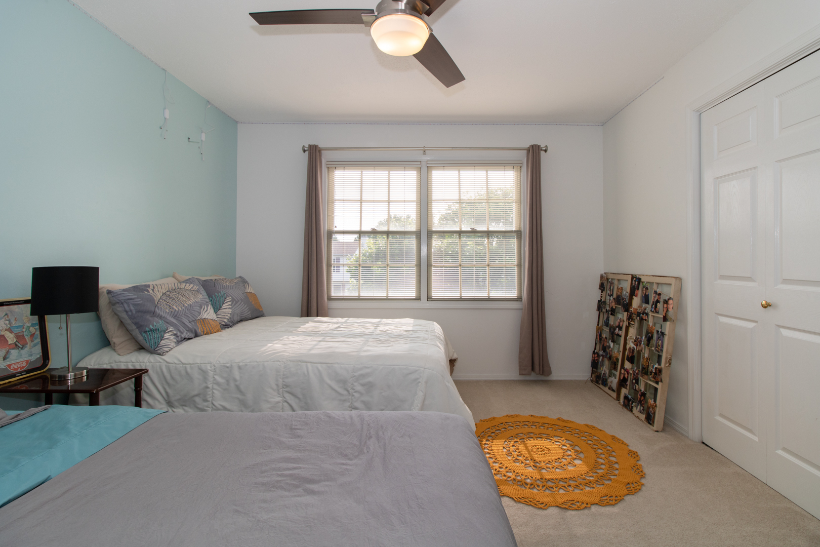 8 Holder Way Bloomington, IL 61704 - Photo 26 of 44 a bedroom with a bed and a chandelier
