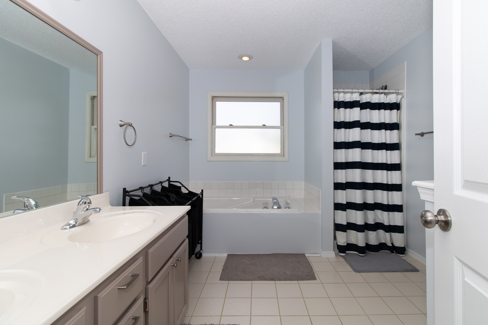 8 Holder Way Bloomington, IL 61704 - Photo 30 of 44 a bathroom with a sink and a bathtub