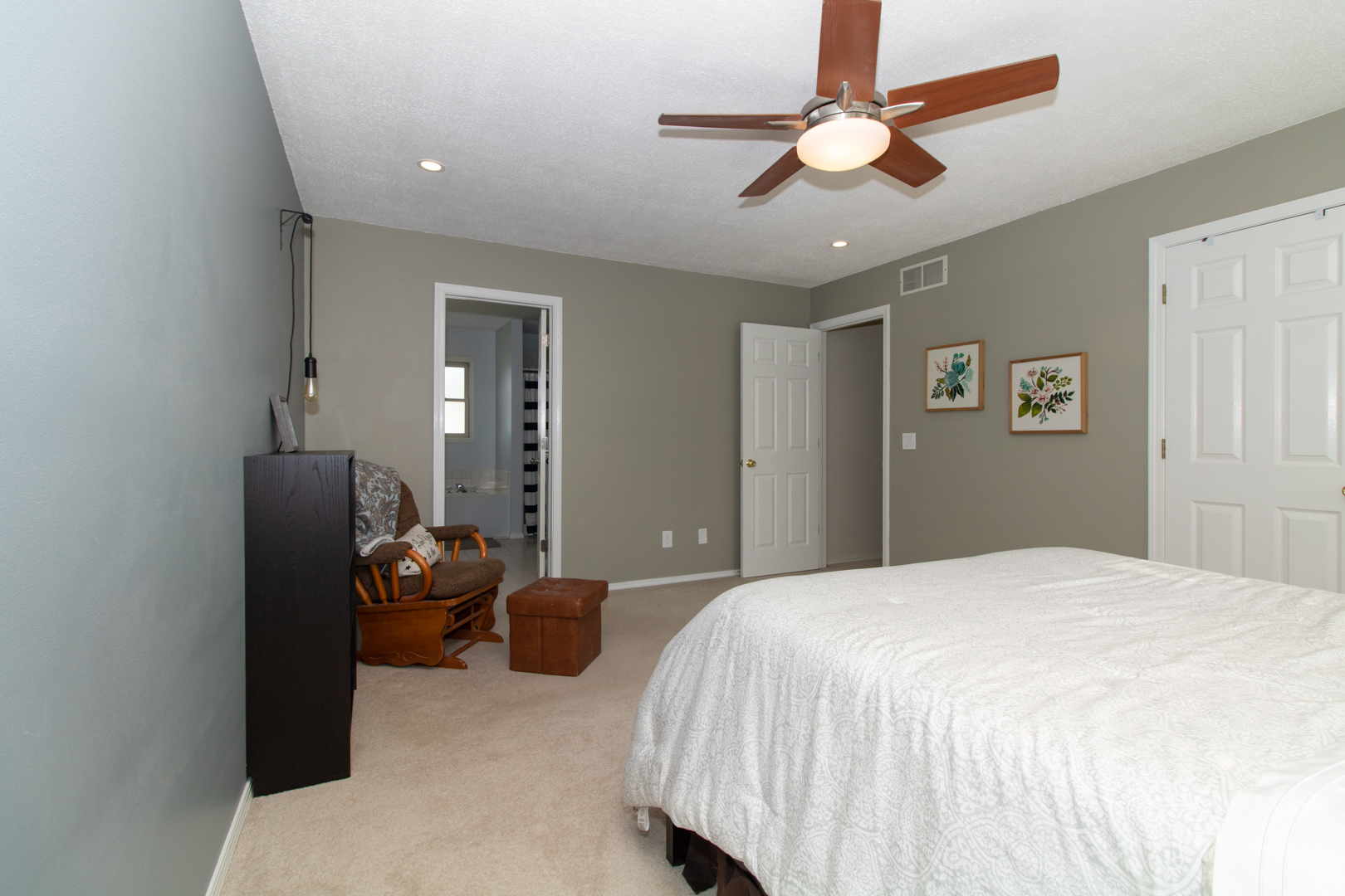 8 Holder Way Bloomington, IL 61704 - Photo 33 of 44 a bedroom with a bed and ceiling fan