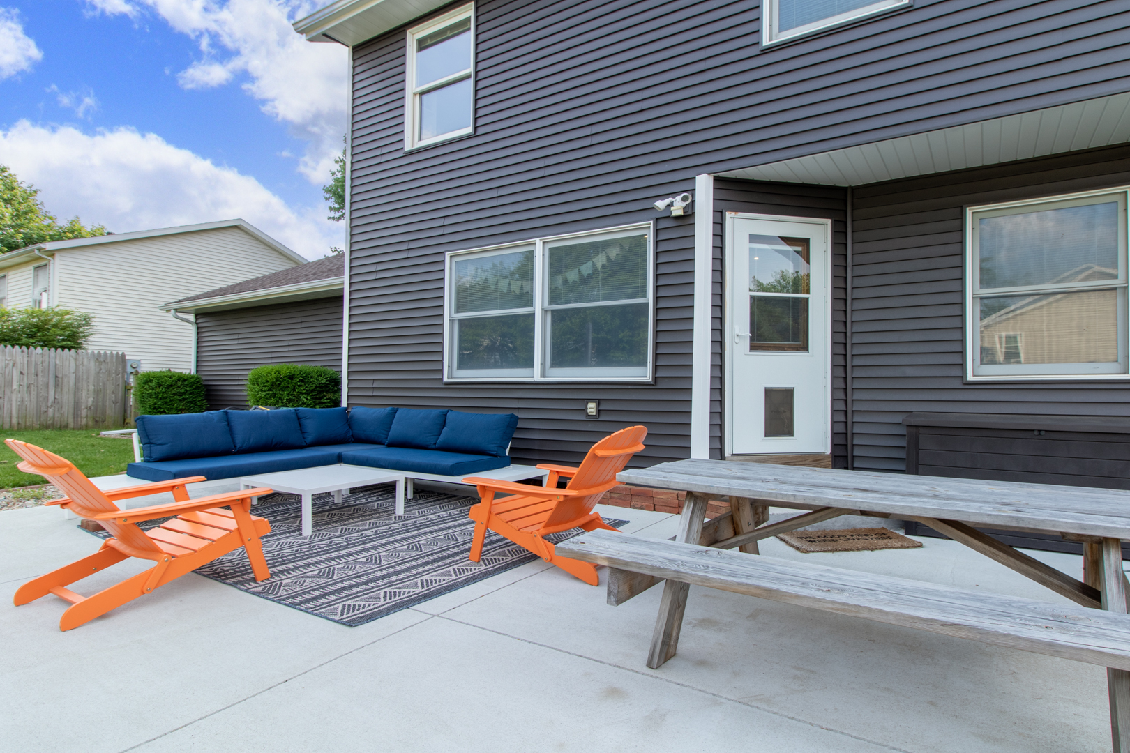 8 Holder Way Bloomington, IL 61704 - Photo 42 of 44 a backyard of a house with outdoor seating