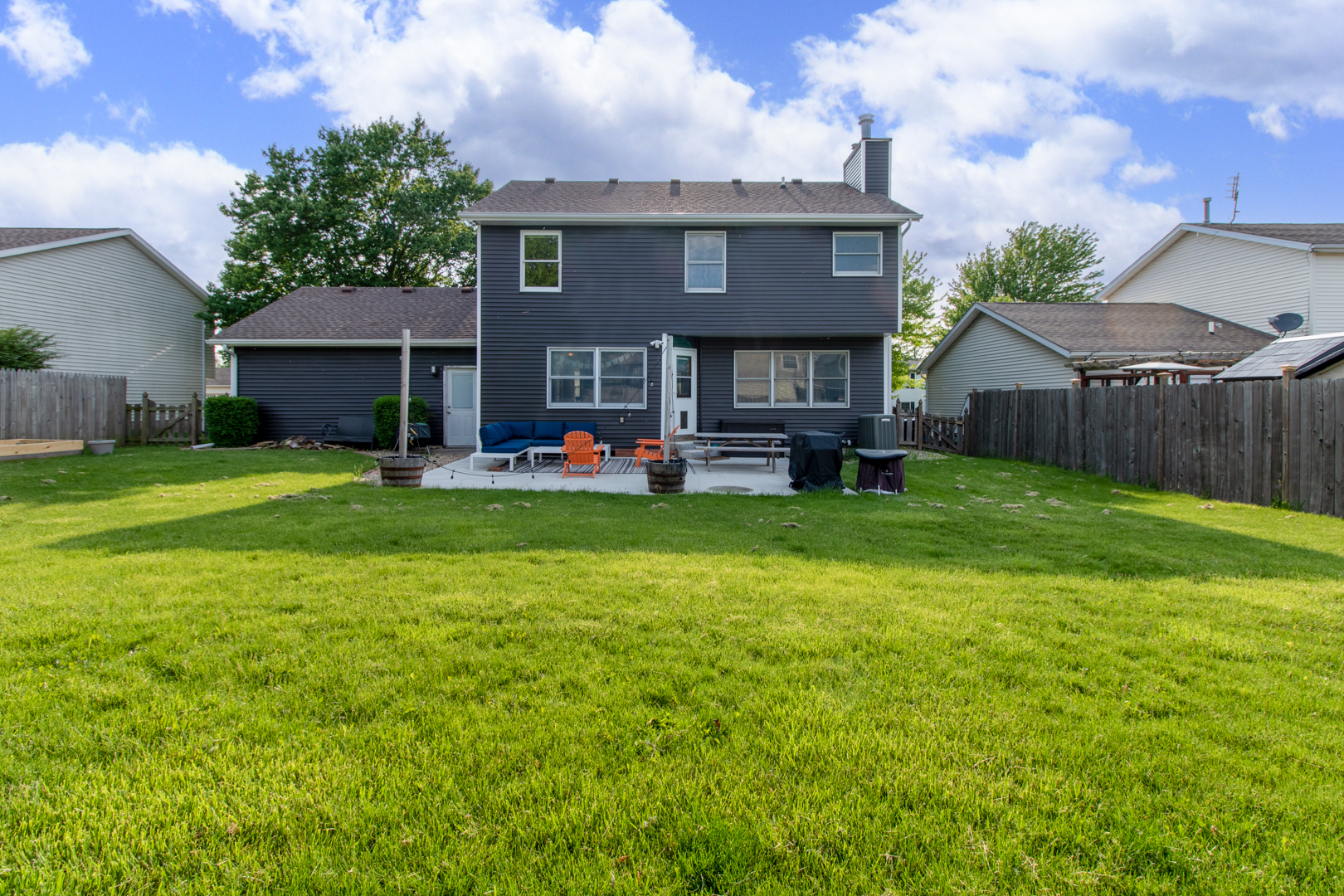 8 Holder Way Bloomington, IL 61704 - Photo 44 of 44 a view of a house with a yard and sitting area