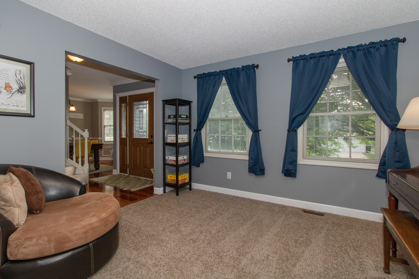8 Holder Way Bloomington, IL 61704 - Photo 6 of 44 a living room with furniture and a large window