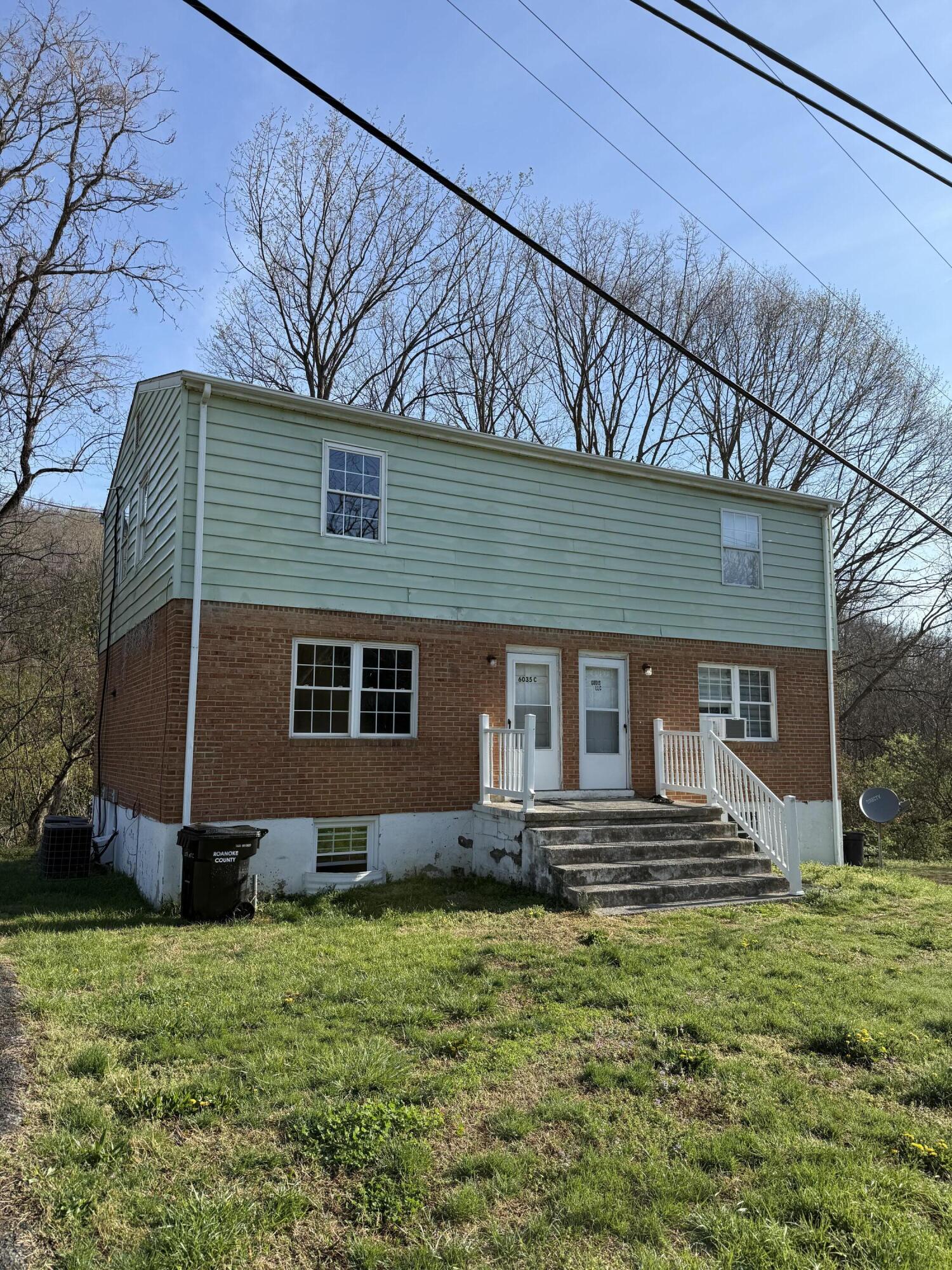 6035 Twine Hollow Road Salem, VA 24153 - Photo 2 of 3 a front view of a house with a yard