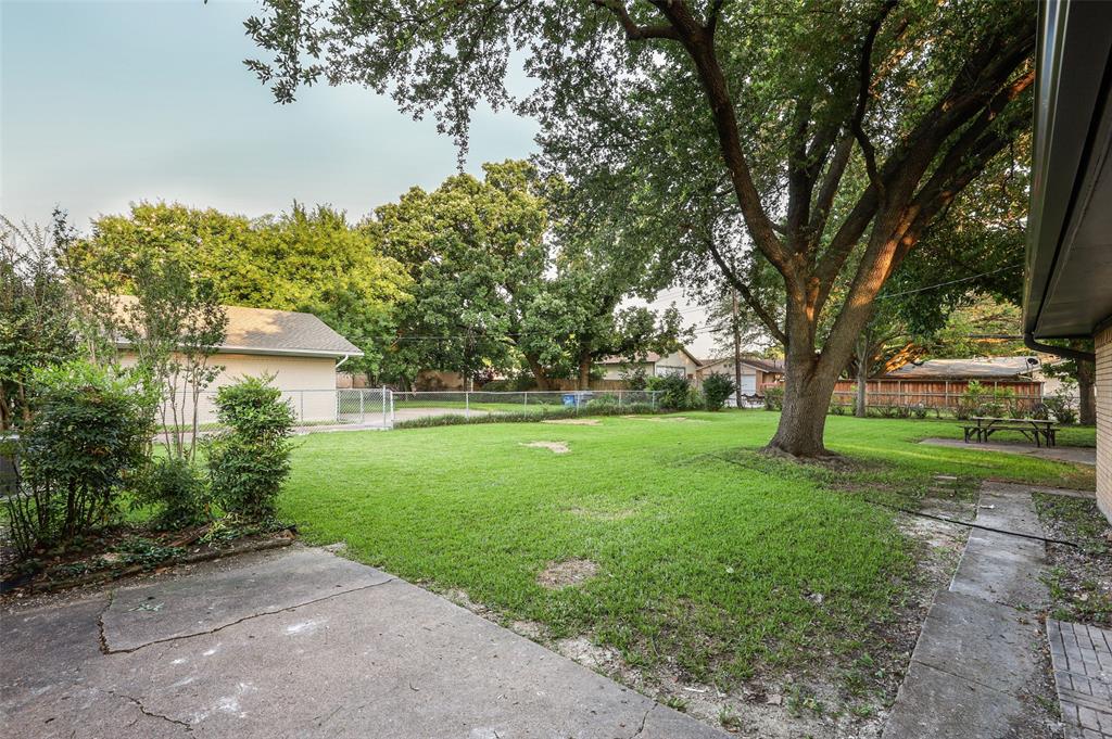 3126 Jubilee Trail Dallas, TX 75229 - Photo 34 of 38 a view of a garden with a tree