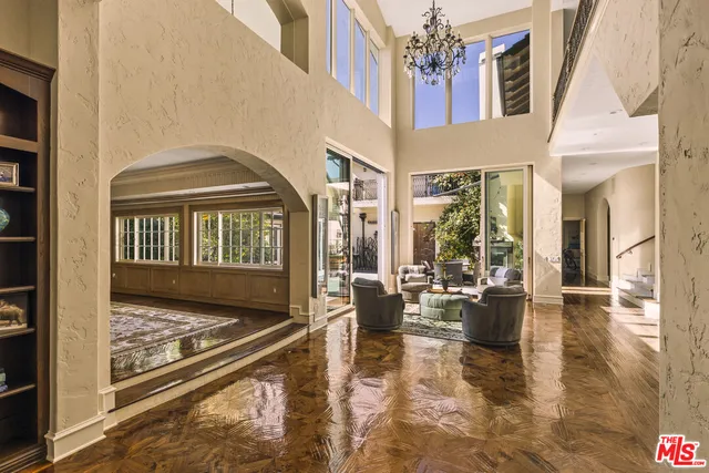 a view of living room filled with furniture