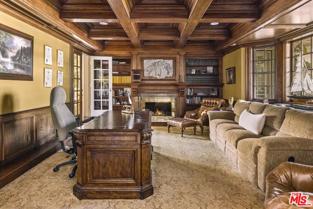 a view of swimming pool with outdoor seating and a patio