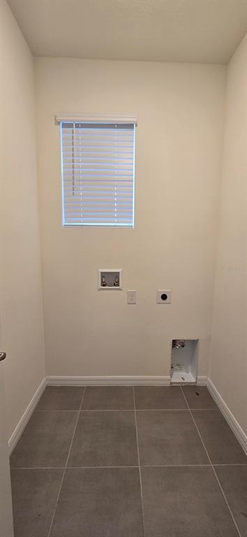 5530 Northwest 40th Loop Ocala, FL 34482 - Photo 14 of 14 a view of a livingroom with an empty space and a window
