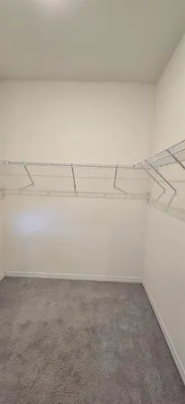 a view of a room with an empty space