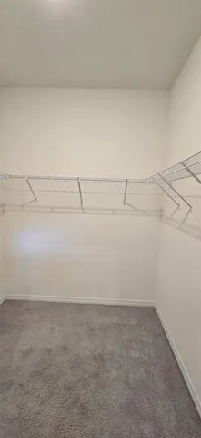 a view of a room with an empty space