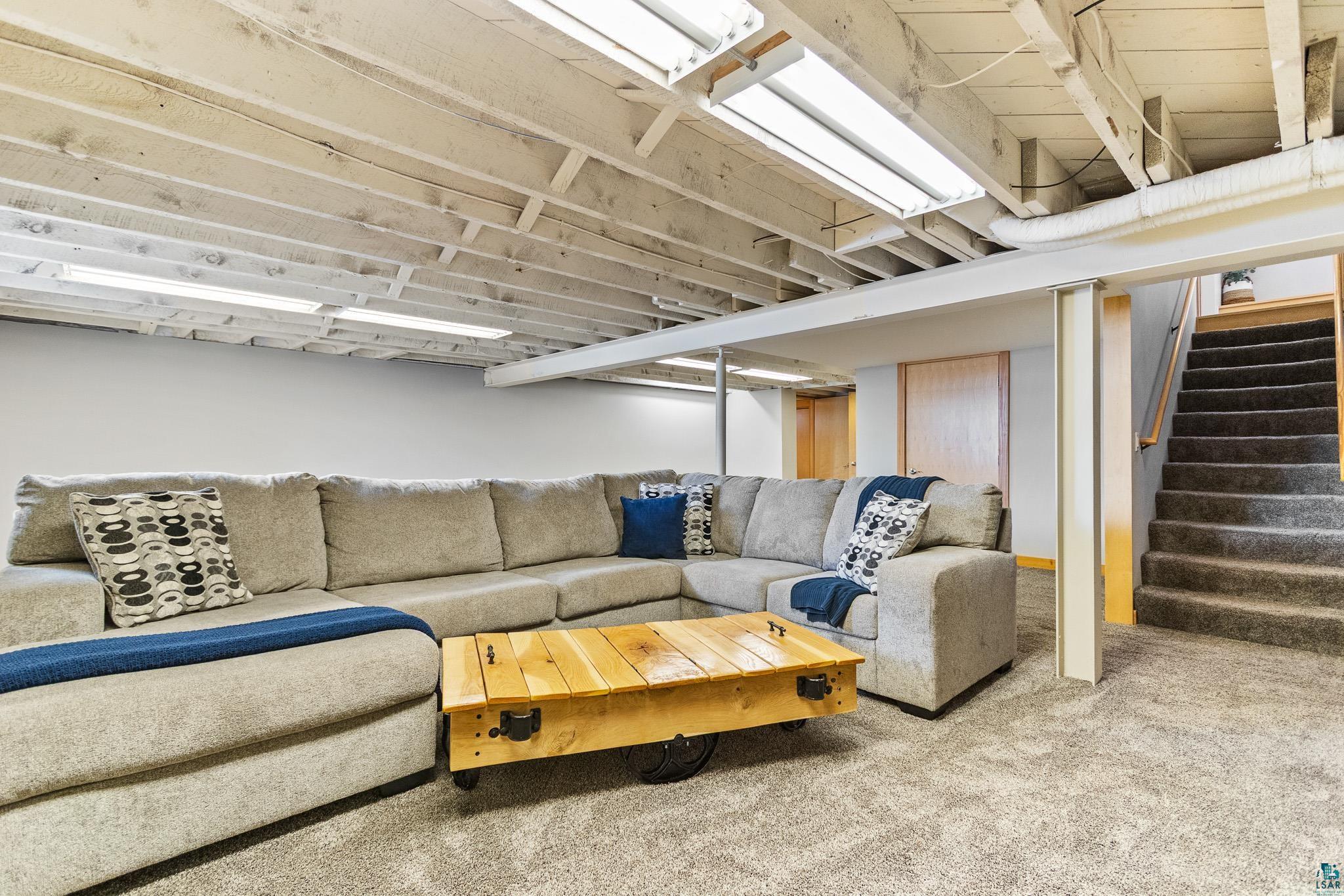 5163 Greenwood Road Duluth, MN 55804 - Photo 37 of 47 Carpeted lower-level space featuring an exposed ceiling with recessed lighting