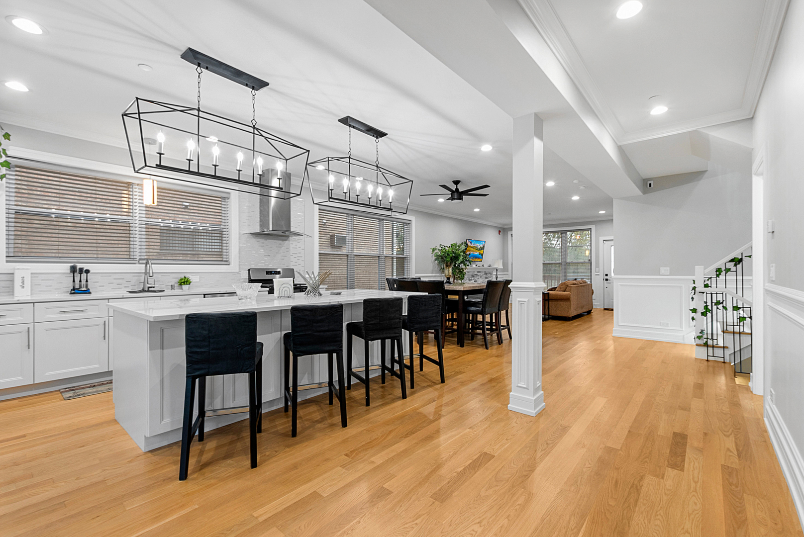 7727 South Roberts Road Bridgeview, IL 60455 - Photo 12 of 36 a kitchen with lots of counter and chairs