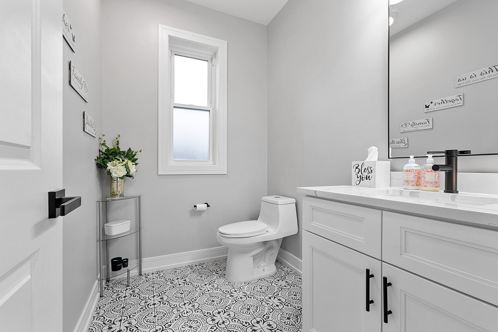 7727 South Roberts Road Bridgeview, IL 60455 - Photo 13 of 36 a bathroom with a sink toilet and a mirror