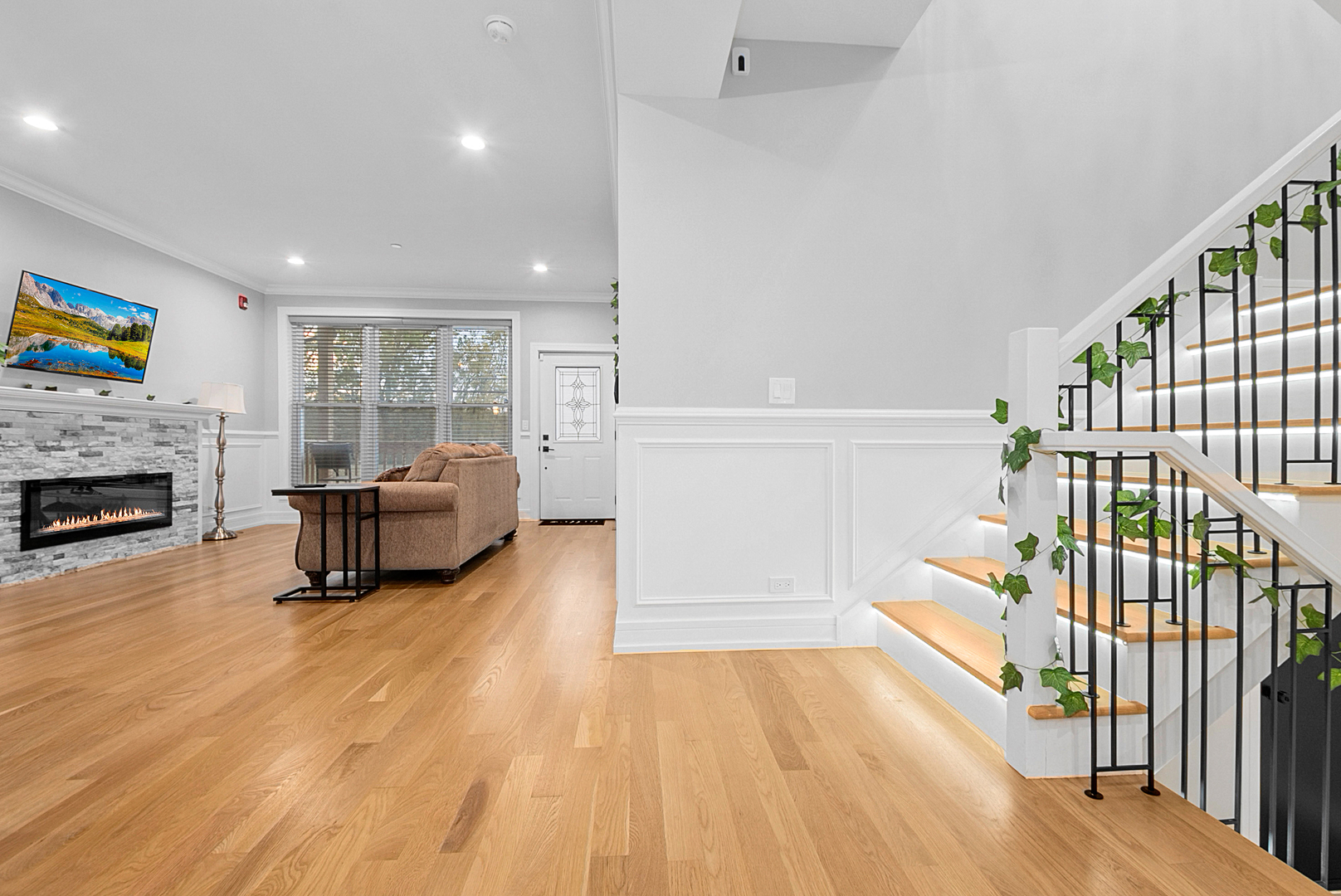 7727 South Roberts Road Bridgeview, IL 60455 - Photo 14 of 36 a living room with furniture and a fireplace