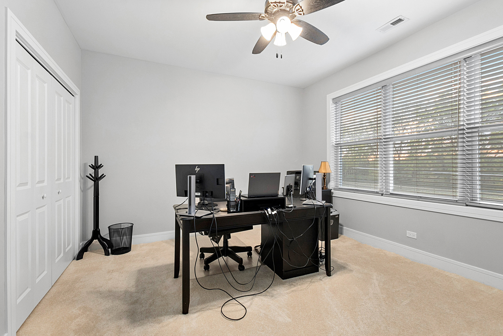 7727 South Roberts Road Bridgeview, IL 60455 - Photo 19 of 36 a view of a workspace with furniture and a window