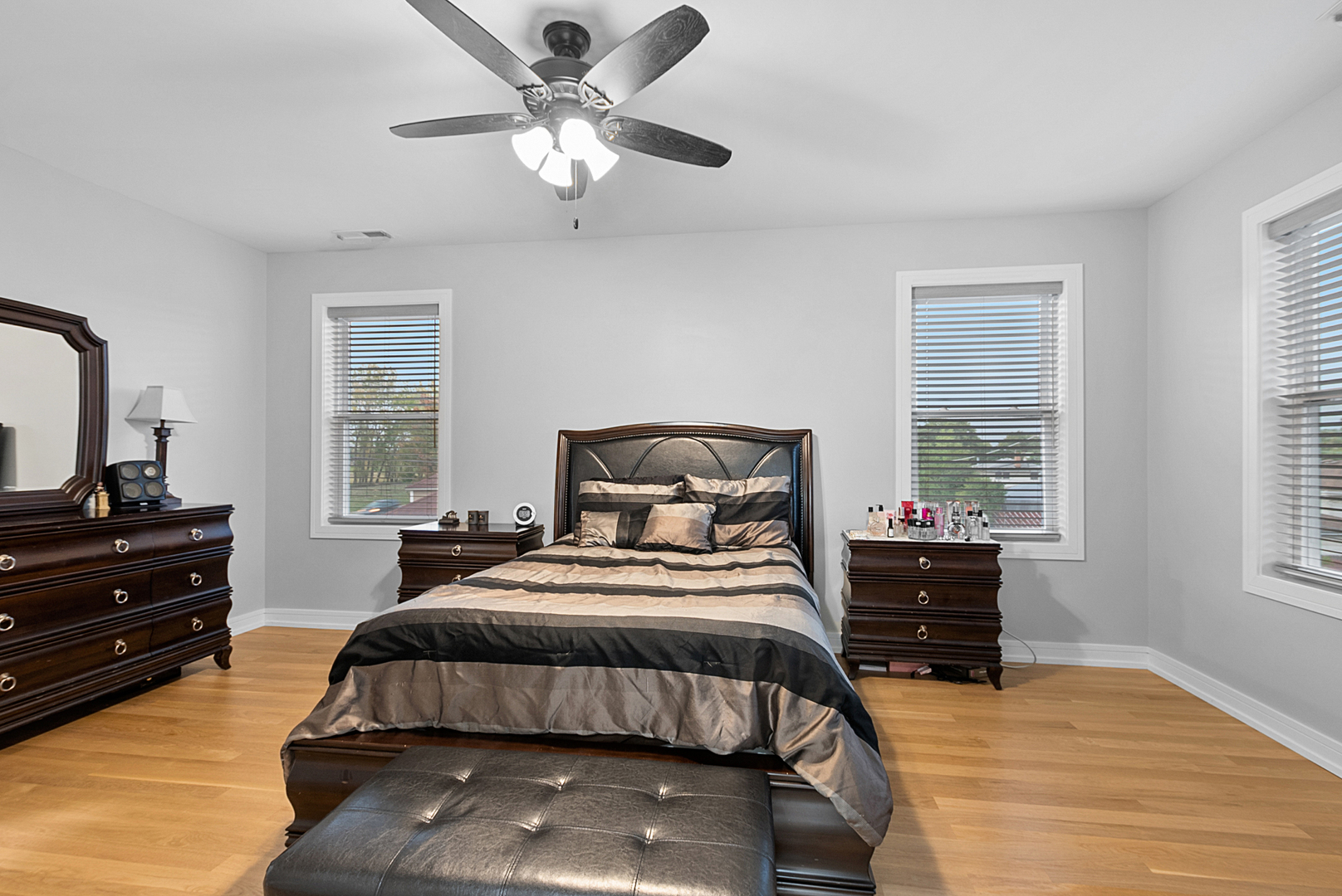 7727 South Roberts Road Bridgeview, IL 60455 - Photo 24 of 36 a bedroom with a bed and window