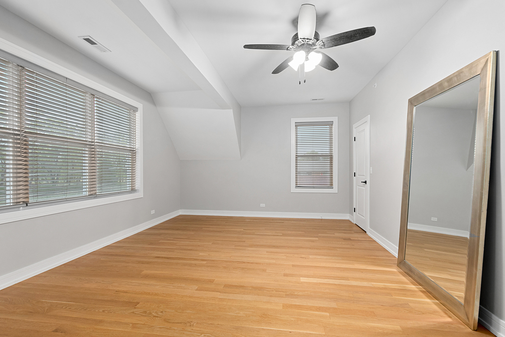 7727 South Roberts Road Bridgeview, IL 60455 - Photo 27 of 36 a view of an empty room with a window