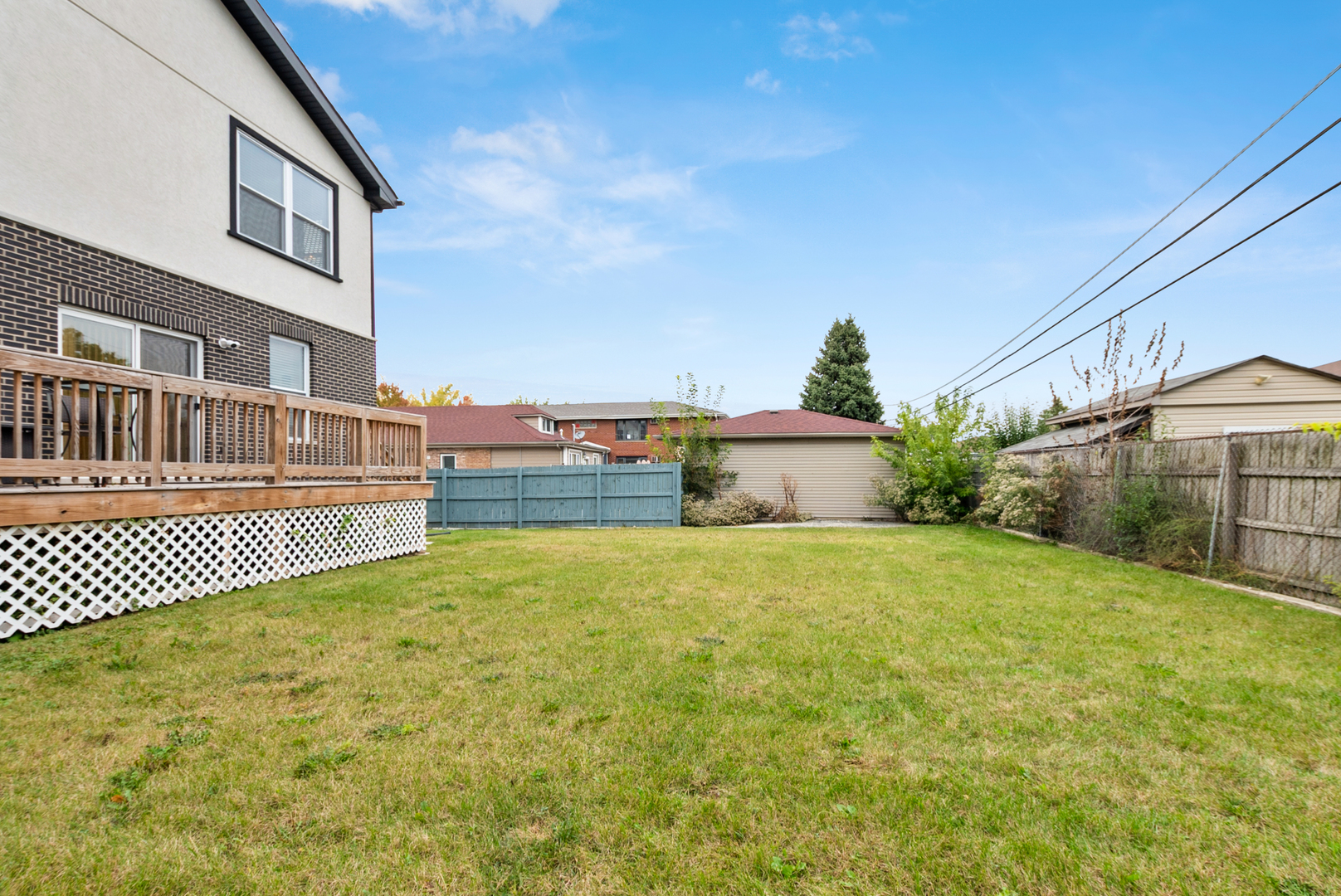 7727 South Roberts Road Bridgeview, IL 60455 - Photo 35 of 36 a front view of a house with a yard