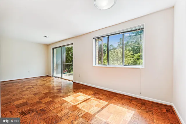 a view of kitchen with wooden floor