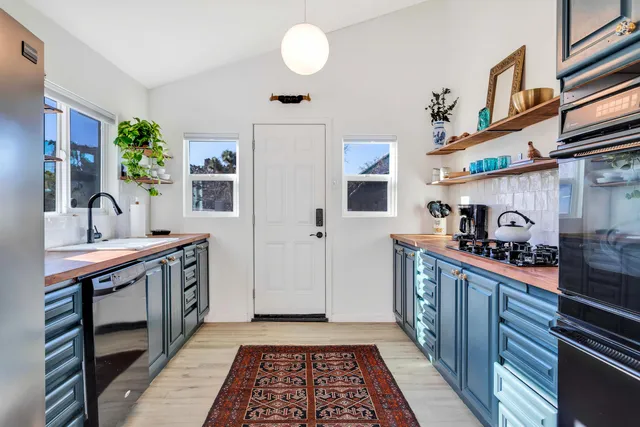a patio with table and chairs