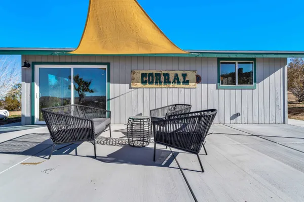 a outdoor space with lots of tables and chairs