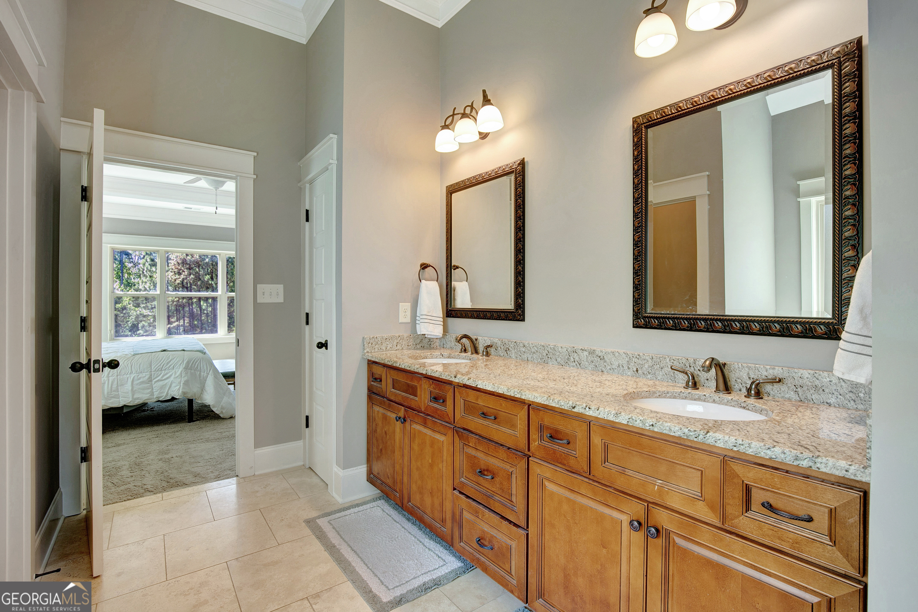 137 Kenmare Row Tyrone, GA 30290 - Photo 84 of 91 a en suite bathroom with double sink and a mirror