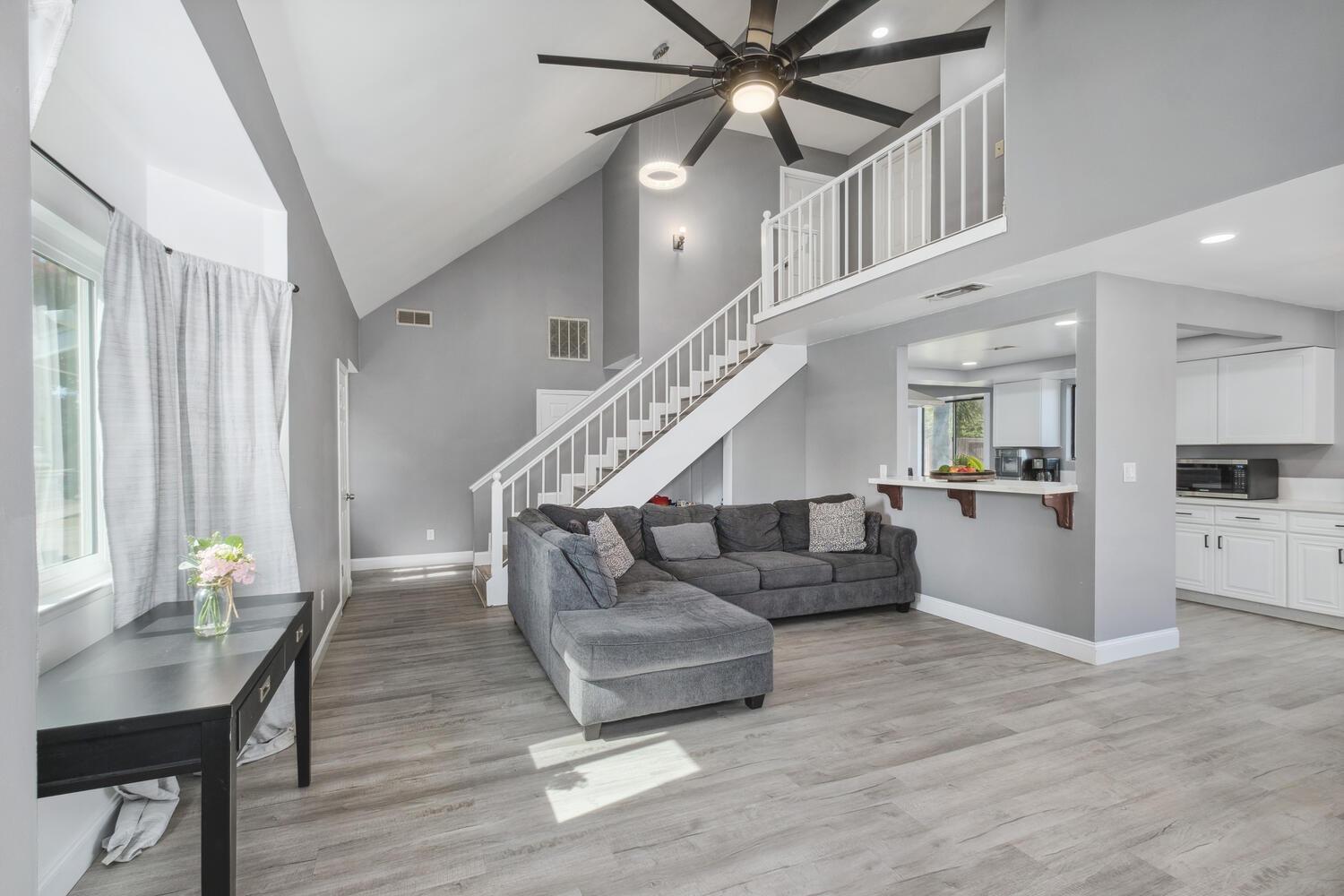 133 Armstrong Avenue Clovis, CA 93611 - Photo 16 of 25 a living room with furniture and wooden floor