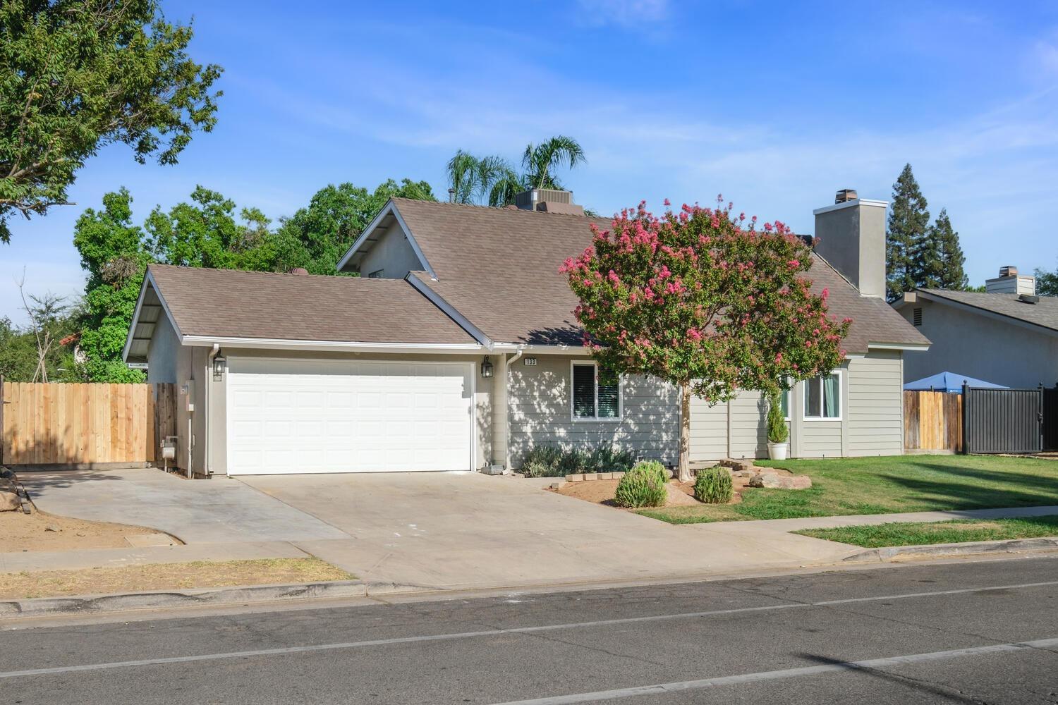 133 Armstrong Avenue Clovis, CA 93611 - Photo 2 of 25 front view of a house with a yard
