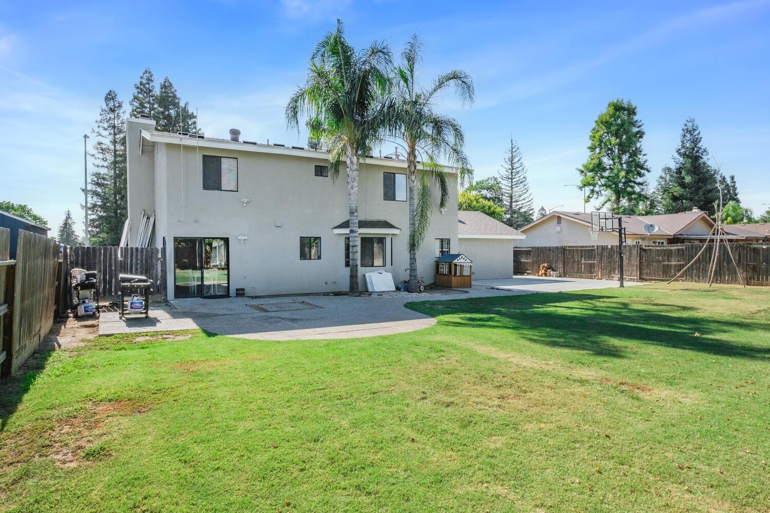 133 Armstrong Avenue Clovis, CA 93611 - Photo 23 of 25 a view of house with yard and outdoor seating