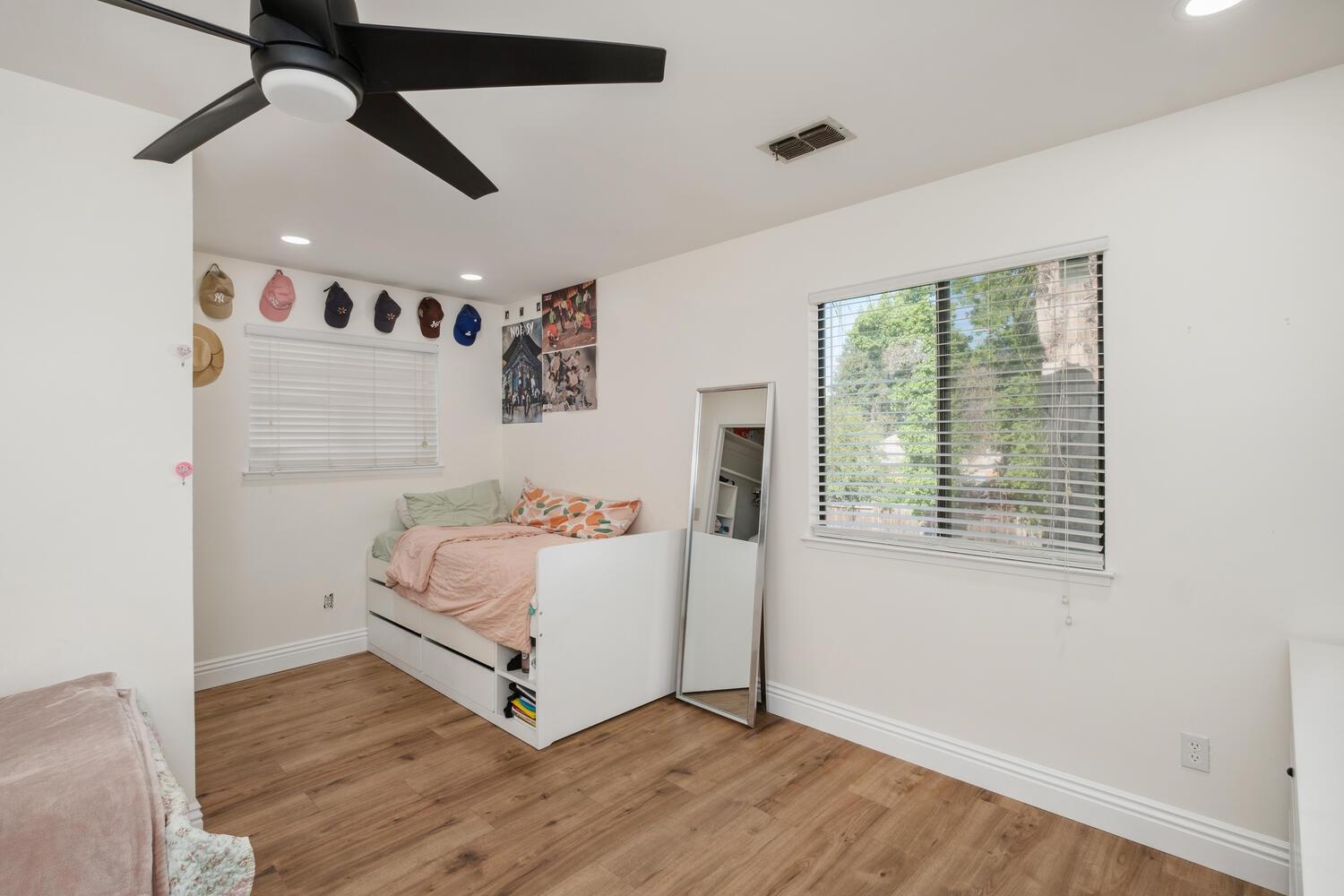 133 Armstrong Avenue Clovis, CA 93611 - Photo 6 of 25 a room with a bed and a window