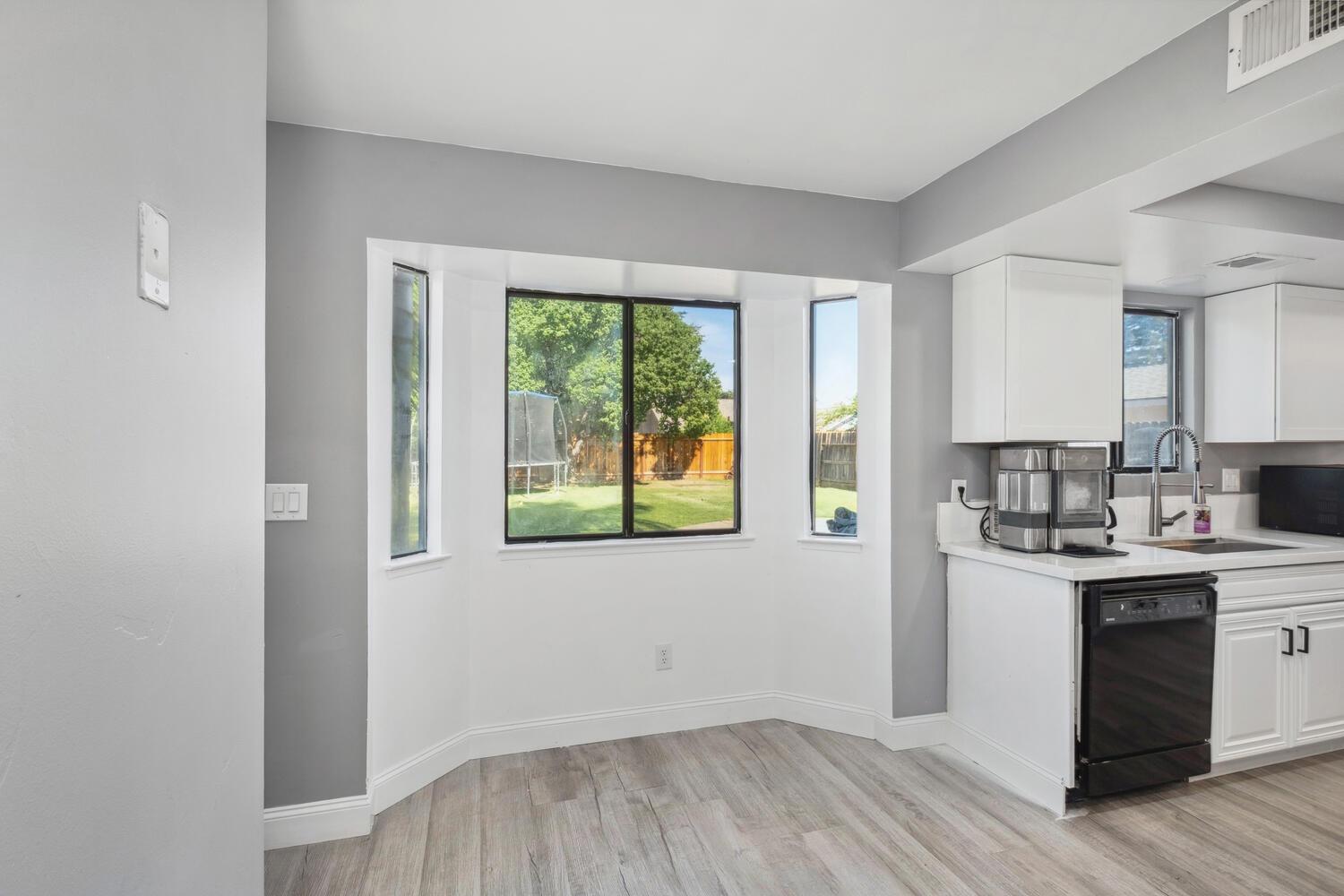 133 Armstrong Avenue Clovis, CA 93611 - Photo 9 of 25 a room with a sink and a window