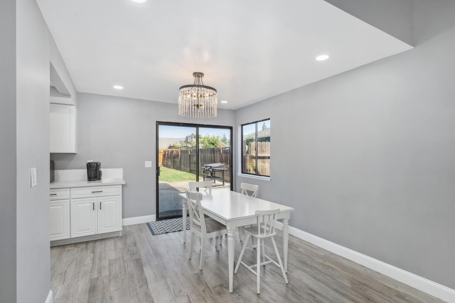 133 Armstrong Avenue Clovis, CA 93611 - Photo 10 of 25 a view of a dining room with furniture window and outside view